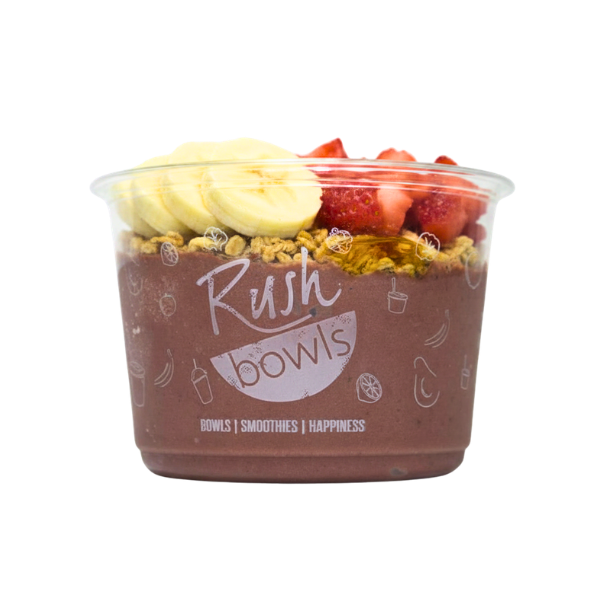 A purple Rush Bowls smoothie bowl with strawberries and granola toppings. 