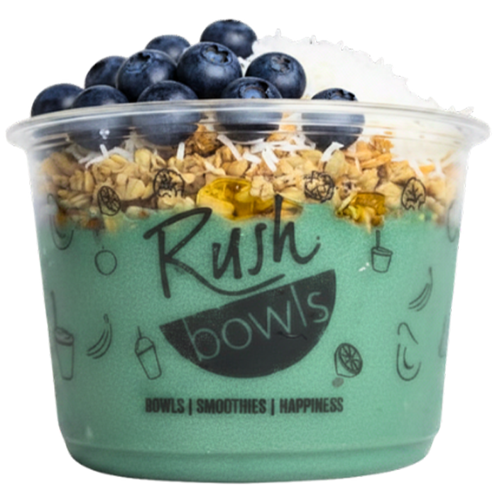 Rush Bowls blue smoothie bowl with blueberries and coconut toppings. 
