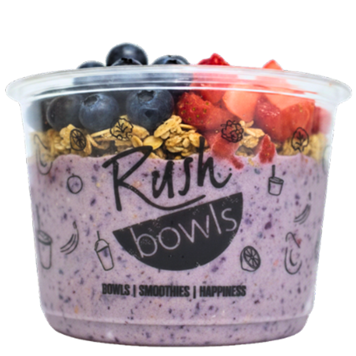 Purple smoothie bowl with flavors of blueberry, raspberry, banana, and much more. 