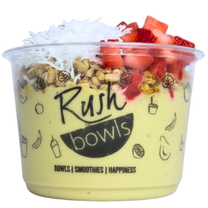 A light yellow smoothie bowl with banana, pineapple, matcha perfect flavoring. 