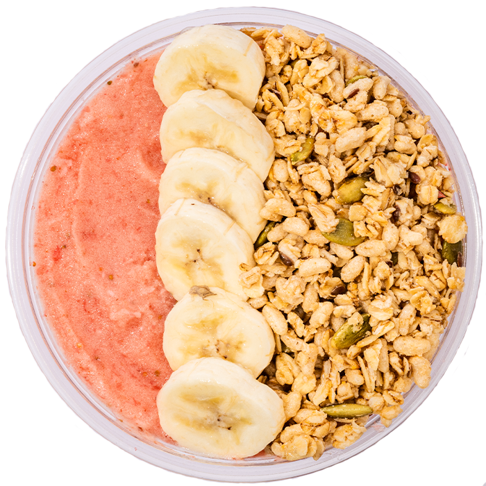 Strawberry, honey, and granola smoothie bowl toppings. 