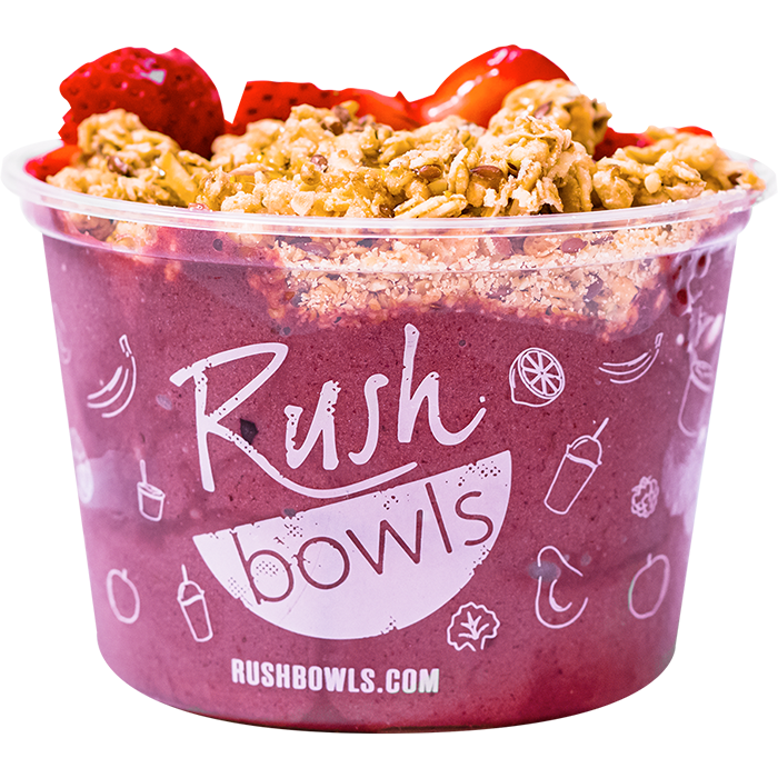 Our pink smoothie bowl flavored with acai, banana, strawberry, and lemonade yummy toppings. 