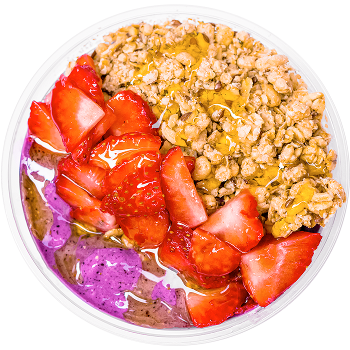 Smoothie bowl topped with organic hemp granola, strawberry and honey. 